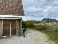 Parkeerplaats naast het huis